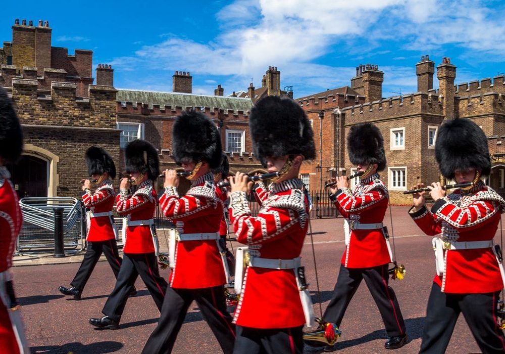 London, UK - June 4, 2015: British guardsmen march down opposite St. James Palace